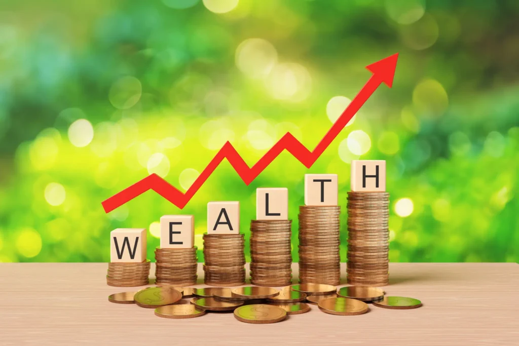 Stacked coins with upward arrow and wealth